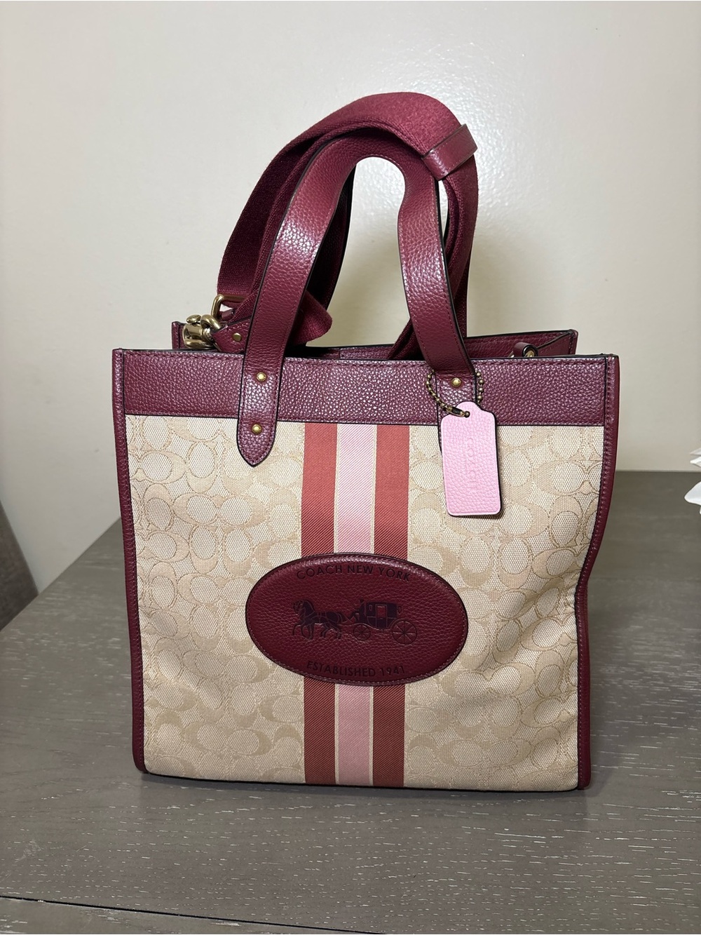 Coach Beige Signature Canvas Tote with Burgundy Trim and Center Stripe